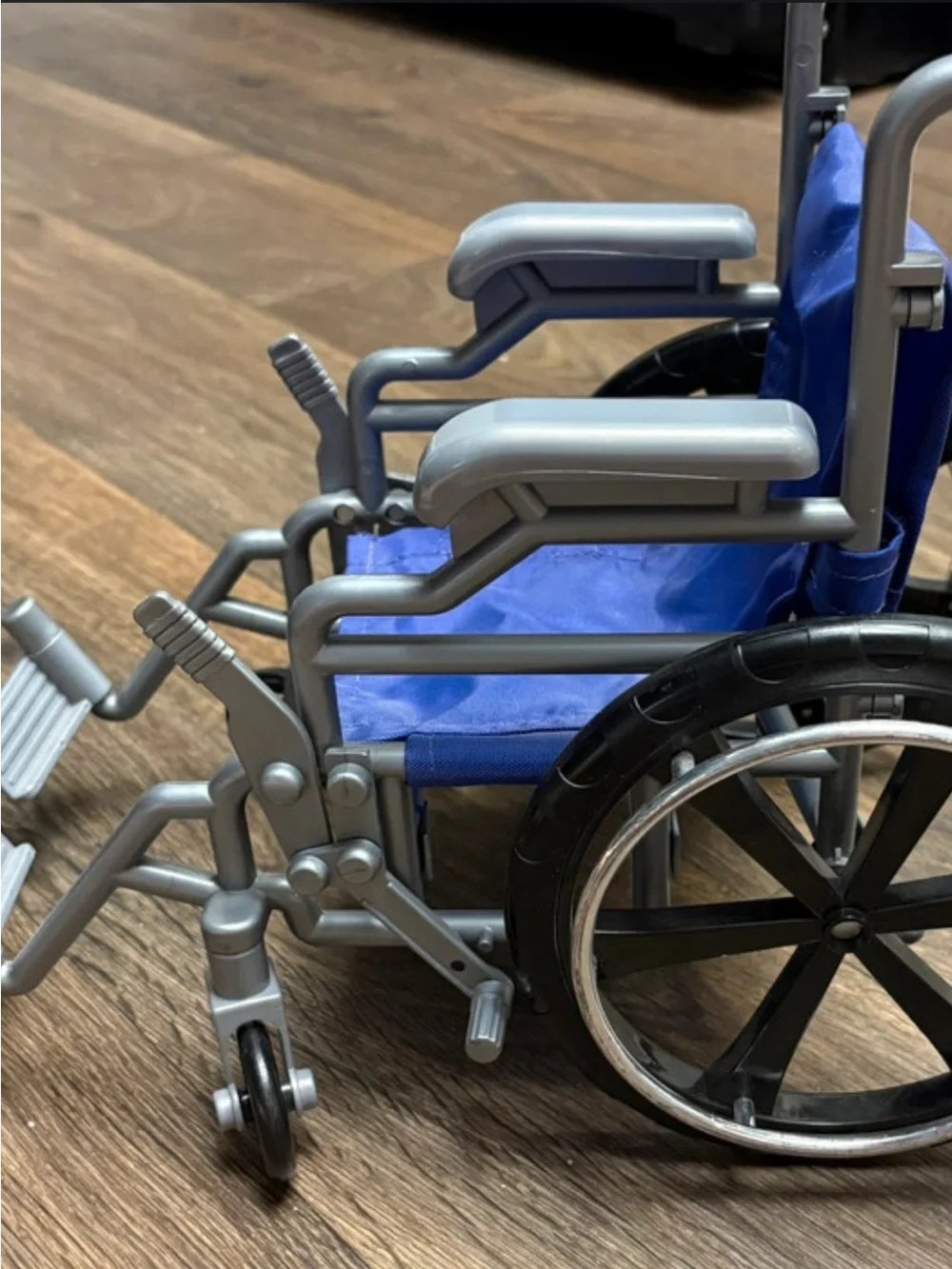 18in Doll Wheelchair Purple with purple crutches